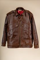 Veste Aviateur Azir en cuir marron présentée à plat, vue de face avec ses détails et finitions.